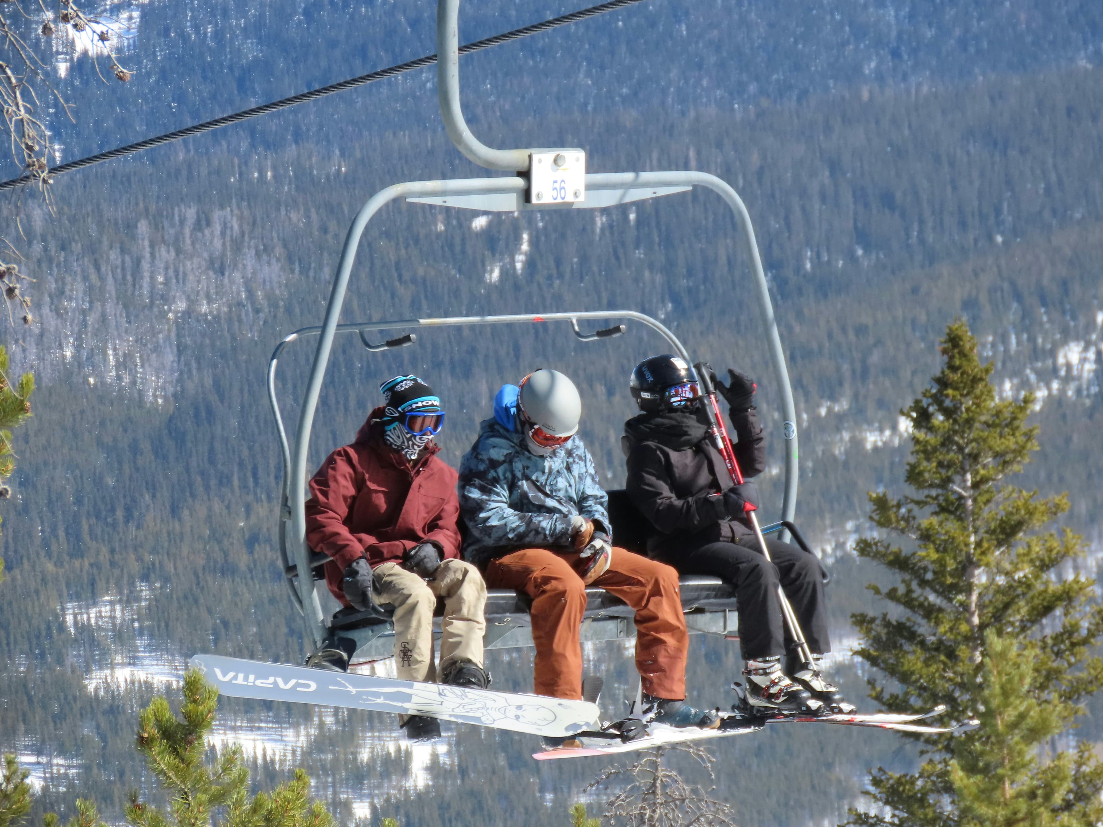 Snowy mountain landscape with groomed ski slope